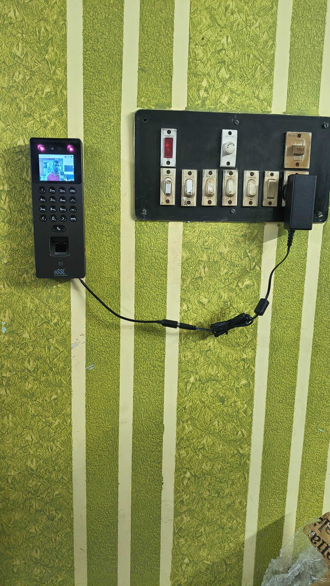 AiFace Orcus customer installation on a green wall
